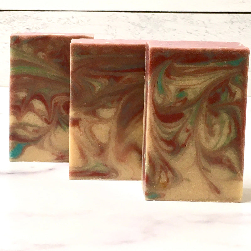 black raspberry vanilla handmade soap with red, white, and blue swirls, the best natural soap for dry skin